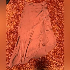 Silk Free People midi skirt in burnt orange. Lightly used, in perfect condition.